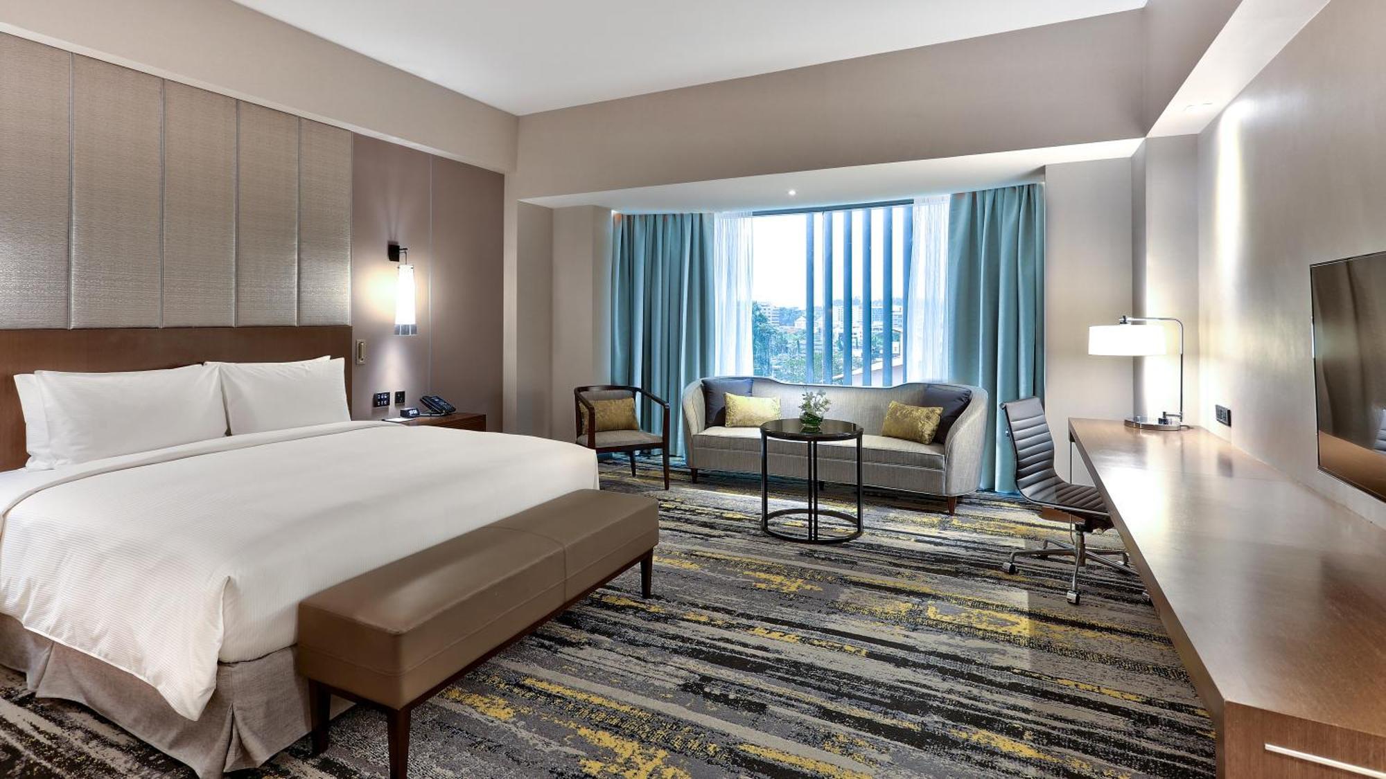 Отель Hilton Кота-Кинабалу Экстерьер фото Deluxe Room