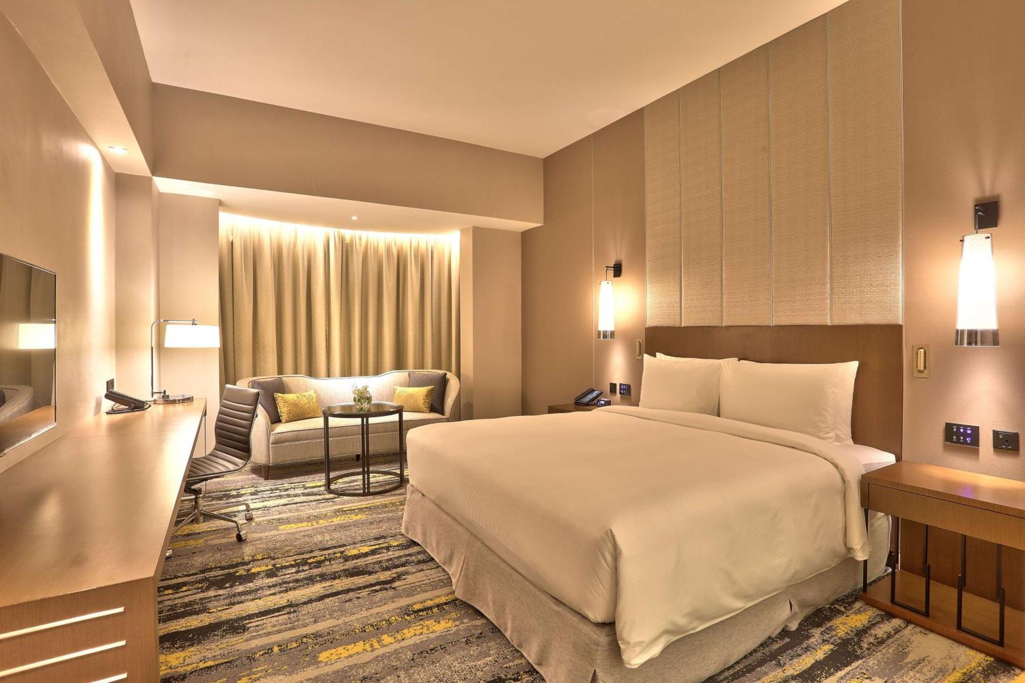 Отель Hilton Кота-Кинабалу Экстерьер фото Deluxe Room